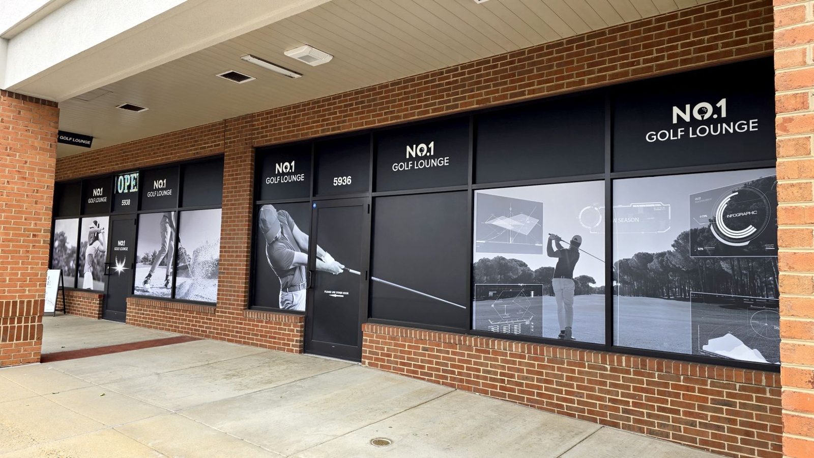 Window graphics installed at NO.1 Golf Lounge storefront